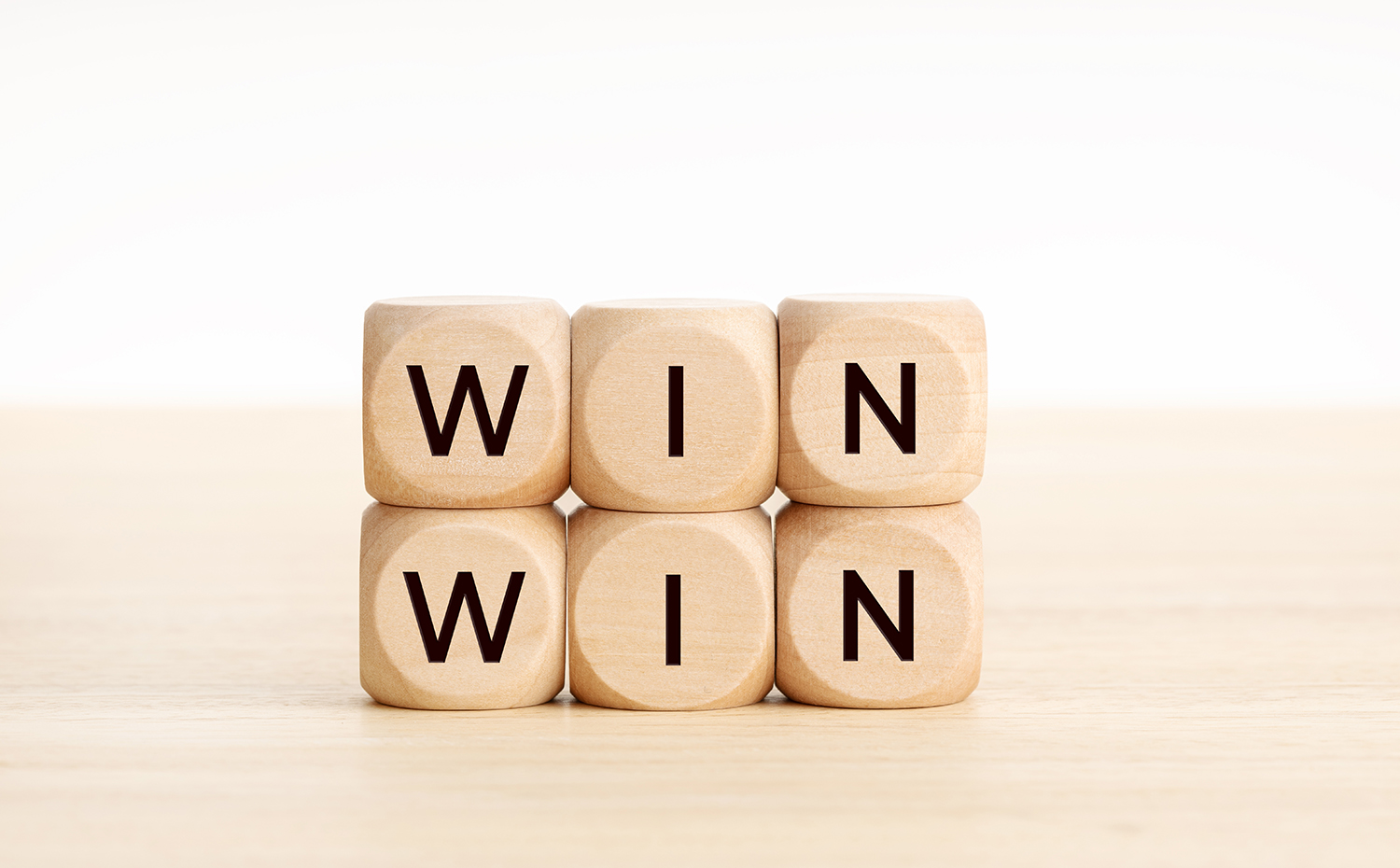 Win Win word on wooden blocks. Copy space. White background